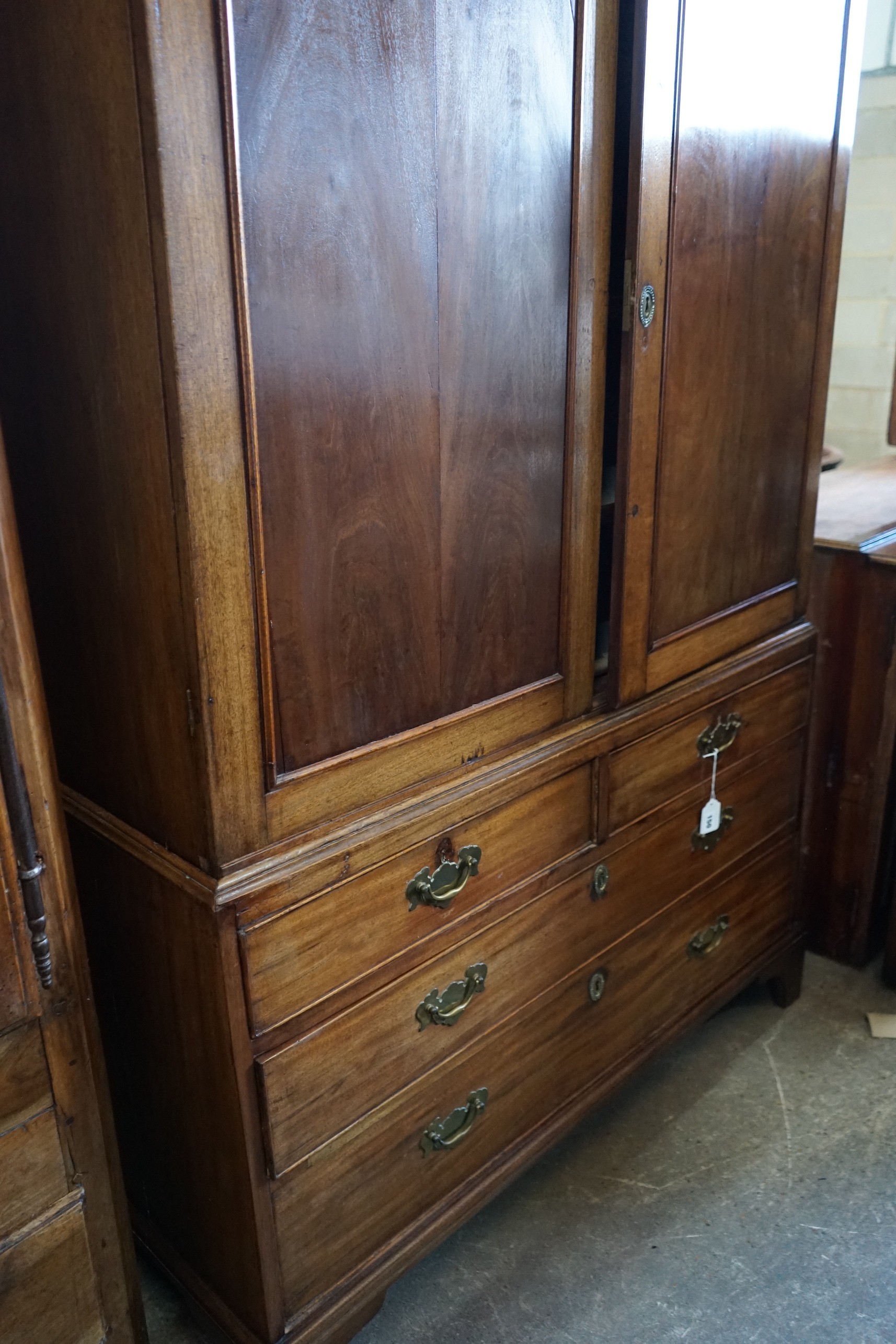 A George III mahogany linen press, width 119cm, depth 59cm, height 175cm